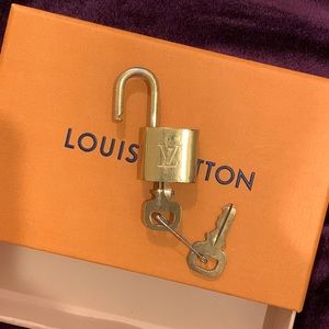 Louis Vuitton Authentic Padlock #309 with 2 keys. Vintage.